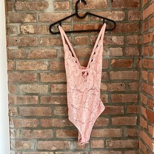 Lacey pink bodysuit